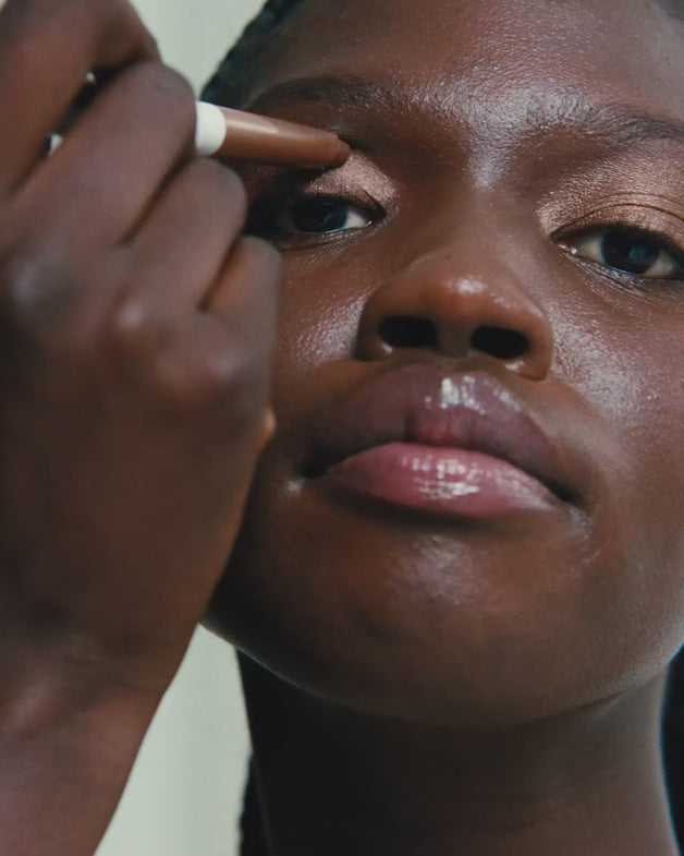 Models applying an assortment of ILIA Eye products to their eyelids, brows, eyelashes.